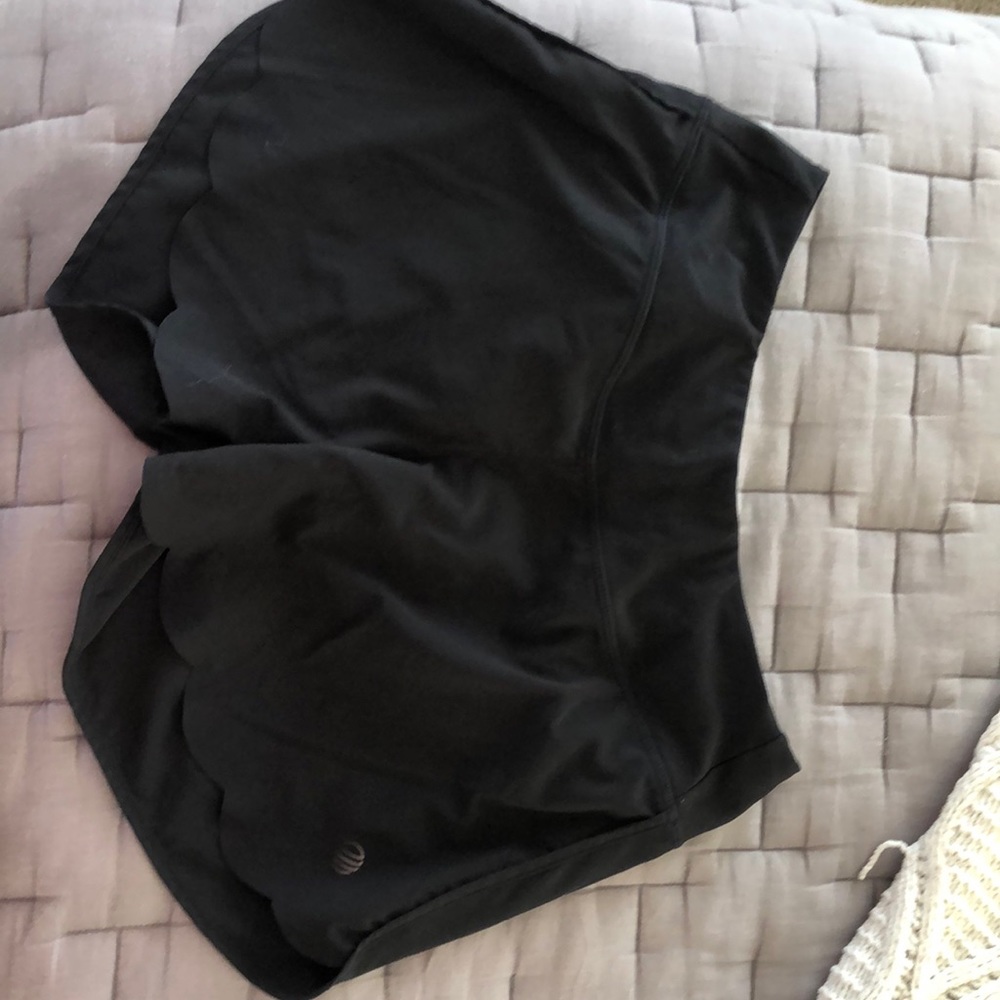 Black shorts with scallop front biker shorts. From MPG